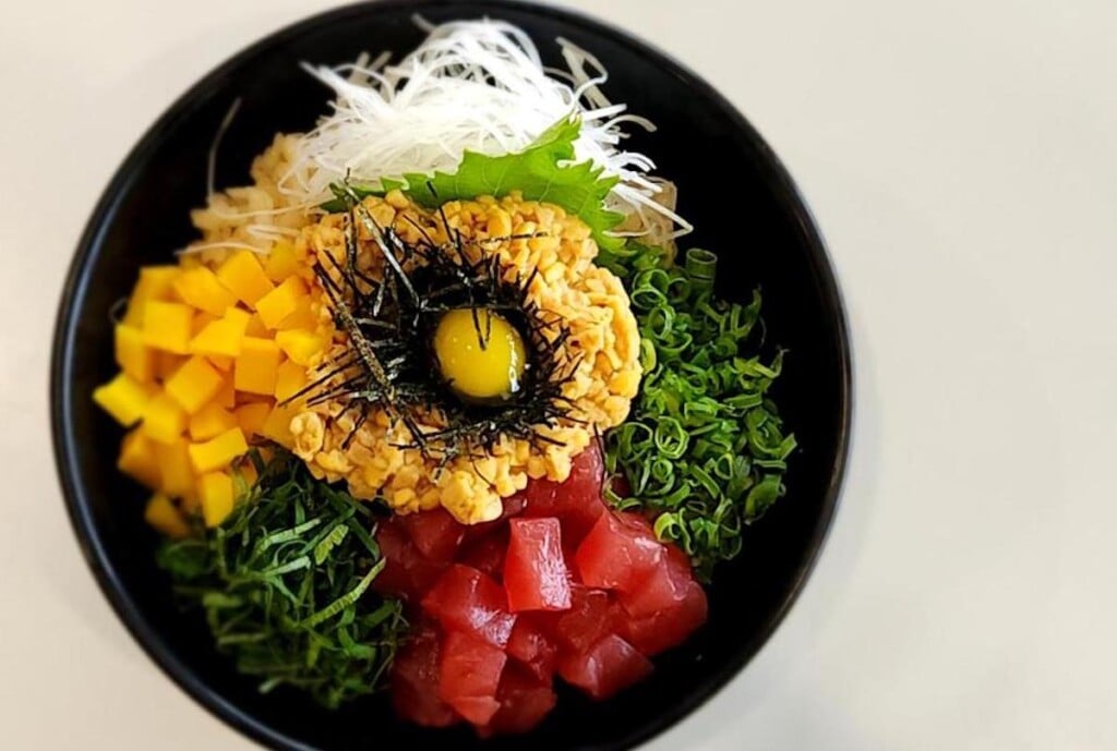 colorful toppings on a rice bowl