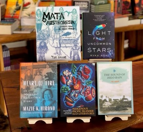 Grouping of books listed in the article from da Shop in Honolulu