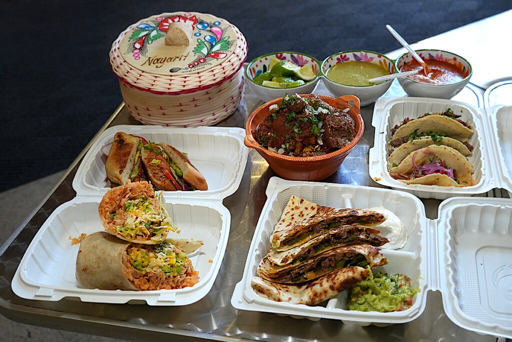 tacos and Assorted Dishes in takeout containers